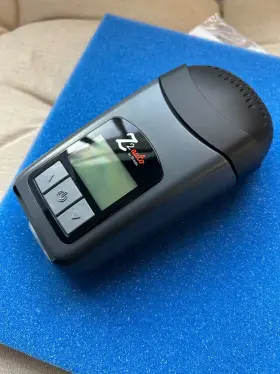 M235552 Breas Z2 Travel C Pap Machine. The Device Is Approximately 6 Inch X 4 1.5