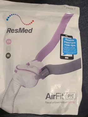 62910 Resmed Airfit P10 Nasal Pillows Size Xs/s/m For Her Brand New Package No Headgear Look