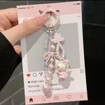 Sanrio Hello Kitty Faux Pearl Beaded Bow Phone Strap Charm Kawaii Y2K 5 Pink New. Price: $20.69.