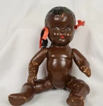 Vintage 11 African American / Black Composite Baby Doll Toy 1930S? Jointed Used. Price: $25.00.