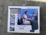 Vintage 1995 Aura Interactor Cushion 3D Sound Experience New Old Stock Nos. Price: $59.99.