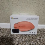 Microsoft 222-00033 Bluetooth Ergonomic Mouse 1955 Peach Sealed New. Price: $39.99.