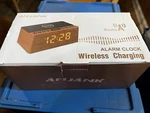 Anjank Bluetooth Radio Alarm Clock Wireless Charging AC190 Wooden Bedside New. Price: $32.50.