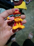 Vintage Pvc Garfield Cat Wearing Cape Mask Holding Chocolates Keychain Paws Used. Price: $12.00.
