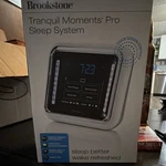 Brookstone Tranquil Moments Pro Sleep Sound Therapy System Black Silver 902888 New. Price: $90.00.