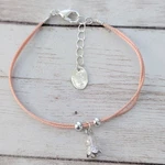 Claires Bracelet Light Peachy Pink Tone With Charm Pre-owned. Price: $8.99.