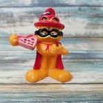 Vintage Pvc Garfield Cat Wearing Cape Mask Holding Chocolates Keychain Paws Used. Price: $14.00.